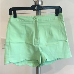 Light green scalloped shorts